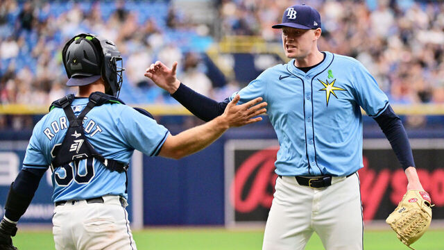 ST PETERSBURG, FLORIDA - MAY 26: Pete Fairbanks #29 of the Tampa Bay Rays celebrates with Ben Rortvedt #30 after defeating the Kansas City Royals 4-1 at Tropicana Field on May 26, 2024 in St Petersburg, Florida.
