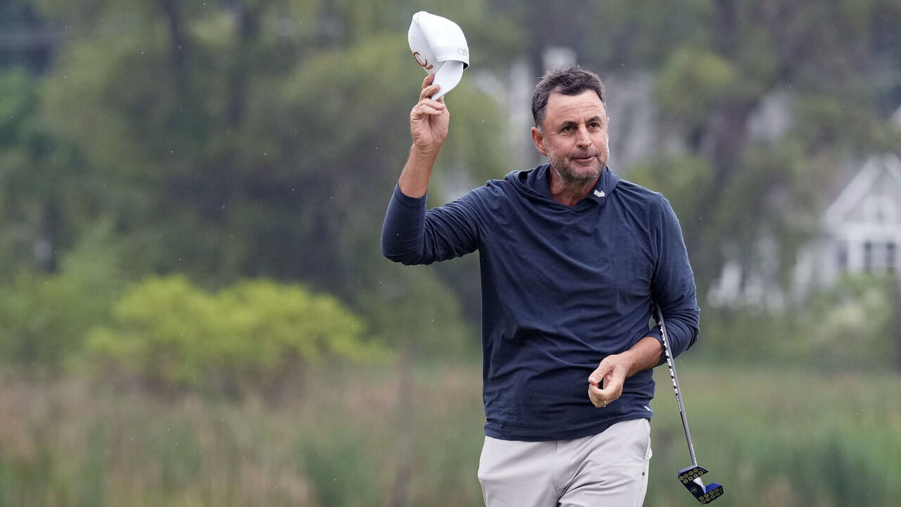 BENTON HARBOR, MICHIGAN - MAY 26: Richard Bland of England celebrates on the 18th green after winning the KitchenAid Senior PGA Championship at Harbor Shores Resort on May 26, 2024 in Benton Harbor, Michigan.