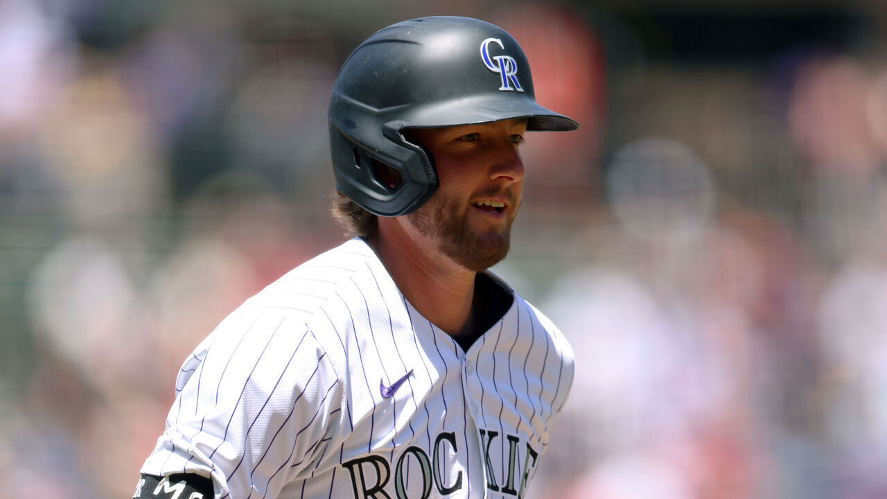 DENVER, COLORADO - MAY 26: Ryan McMahon #24 of the Colorado Rockies rounds the bases after hitting a home run in the first inning of the game against the Philadelphia Phillies at Coors Field on May 26, 2024 in Denver, Colorado.