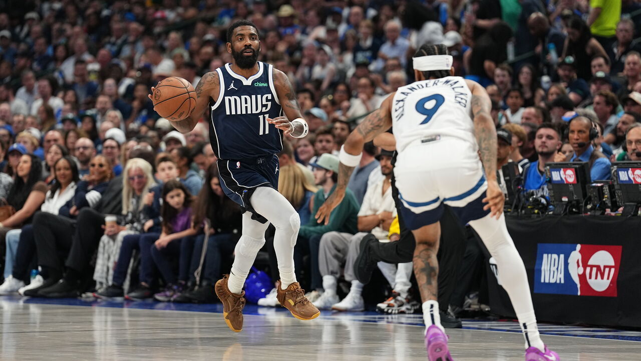 DALLAS, TX - MAY 26: Kyrie Irving #11 of the Dallas Mavericks handles the ball during the game against the Minnesota Timberwolves during Game 3 of the Western Conference Finals of the 2024 NBA Playoffs on May 26, 2024 at the American Airlines Center in Dallas, Texas. Mandatory Copyright Notice: Copyright 2024 NBAE
