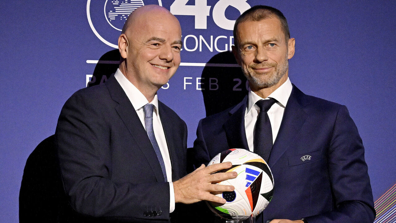 PARIS, FRANCE - FEBRUARY 08: Gianni Infantino, President of FIFA, poses for a photograph with a EURO 2024 Match Ball with Aleksander Ceferin, President of UEFA, during the 48th UEFA Ordinary Congress Meeting at Maison De La Mutualite on February 08, 2024 in Paris, France.