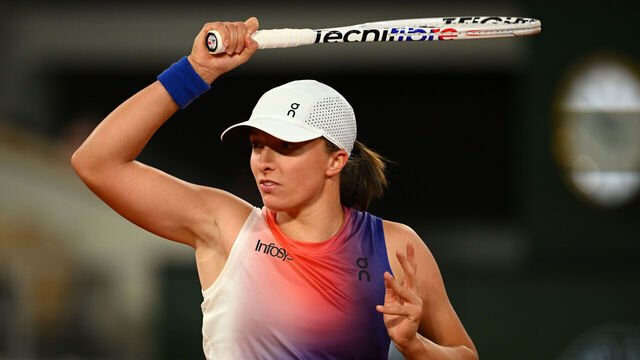 PARIS, FRANCE - MAY 27: Iga Swiatek of Poland plays a forehand against Leolia Jeanjean of France in the Women's Singles first round match on Day Two of the 2024 French Open at Roland Garros on May 27, 2024 in Paris, France.