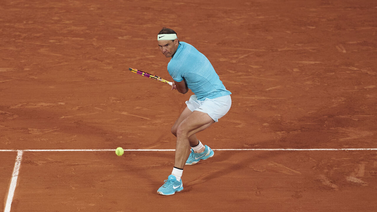 PARIS, FRANCE - MAY 27: Rafael Nadal of Spain plays a backhand against Alexander Zverev of Germany in the Men's Singles first round match on Day Two of the 2024 French Open at Roland Garros on May 27, 2024 in Paris, France.
