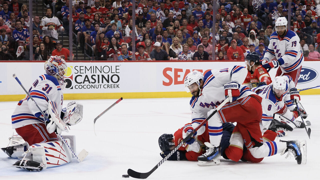 SUNRISE, FLORIDA - MAY 26: Evan Rodrigues #17 of the Florida Panthers lays on the ground after being hit by Jacob Trouba (not pictured) #8 of the New York Rangers during the second period in Game Three of the Eastern Conference Final of the 2024 Stanley Cup Playoffs at Amerant Bank Arena on May 26, 2024 in Sunrise, Florida.