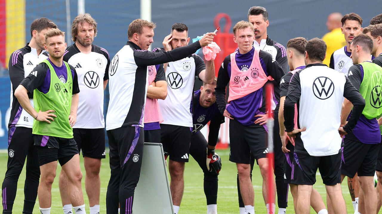 JENA, GERMANY - MAY 27: Julian Nagelsmann, Head Coach of Germany, speaks to his players in a huddle during day one of the training camp on May 27, 2024 at Ad Hoc Arena in Jena, Germany.