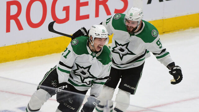 EDMONTON, CANADA - MAY 27: Jason Robertson #21 of the Dallas Stars celebrates after his third goal with Tyler Seguin #91 of the Dallas Stars during the third period in Game Three of the Western Conference Final of the 2024 Stanley Cup Playoffs at Rogers Place on May 27, 2024 in Edmonton, Alberta, Canada.