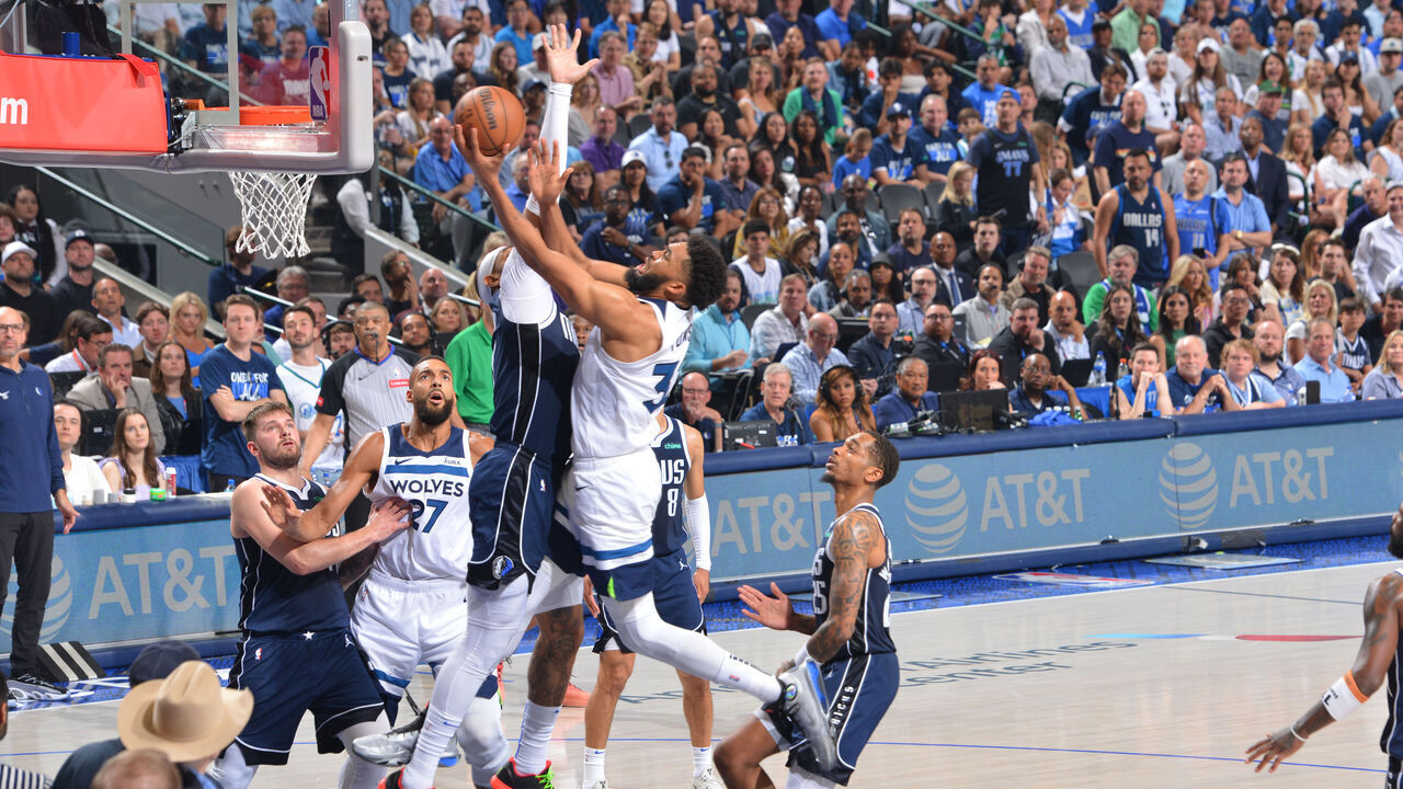 DALLAS, TX - MAY 26: Karl-Anthony Towns #32 of the Minnesota Timberwolves drives to the basket during the game against the Dallas Mavericks during Game 3 of the Western Conference Finals of the 2024 NBA Playoffs on May 26, 2024 at the American Airlines Center in Dallas, Texas. Mandatory Copyright Notice: Copyright 2024 NBAE