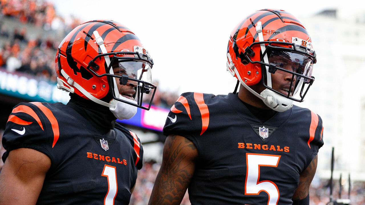 CINCINNATI, OH - DECEMBER 16: Cincinnati Bengals wide receiver Tee Higgins (5) walks off the field with wide receiver Ja'Marr Chase (1) during the game against the Minnesota Vikings and the Cincinnati Bengals on December 16, 2023, at Paycor Stadium in Cincinnati, OH.