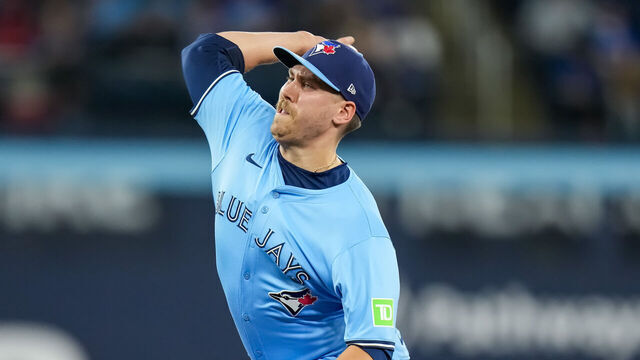 TORONTO, ON - MAY 11: Erik Swanson #50 of the Toronto Blue Jays pitches against the Minnesota Twins on May 11, 2024 at Rogers Centre in Toronto, Ontario, Canada.