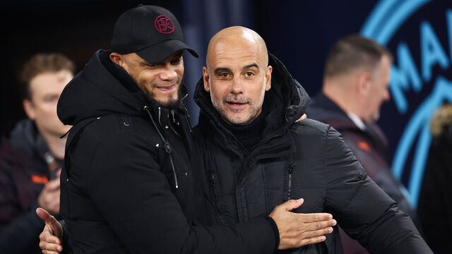 MANCHESTER, ENGLAND - JANUARY 31: Burnley manager Vincent Kompany and Manchester City manager Pep Guardiola during the Premier League match between Manchester City and Burnley FC at Etihad Stadium on January 31, 2024 in Manchester, England.