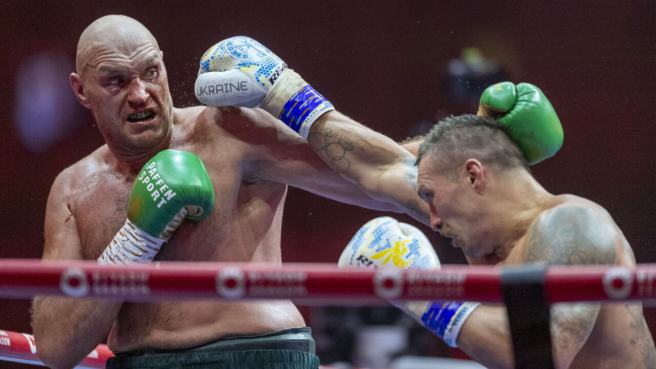 RIYADH, SAUDI ARABIA - MAY 19: Oleksandr Usyk (R) of Ukraine in action against Tyson Fury (L) of United Kingdom during heavyweight boxing world championship fight at Kingdom Arena in Riyadh, Saudi Arabia on May 19, 2024.