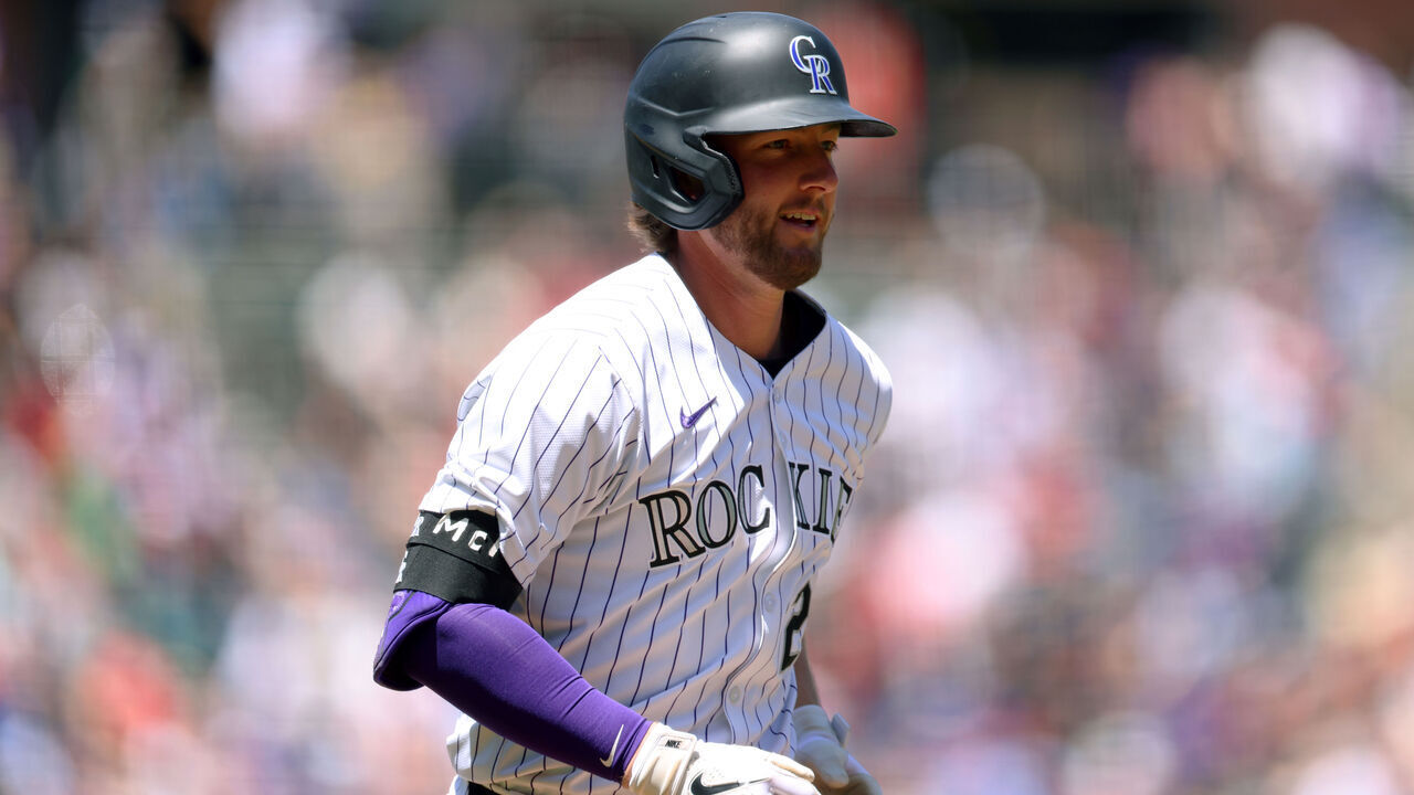 DENVER, COLORADO - MAY 26: Ryan McMahon #24 of the Colorado Rockies rounds the bases after hitting a home run in the first inning of the game against the Philadelphia Phillies at Coors Field on May 26, 2024 in Denver, Colorado.