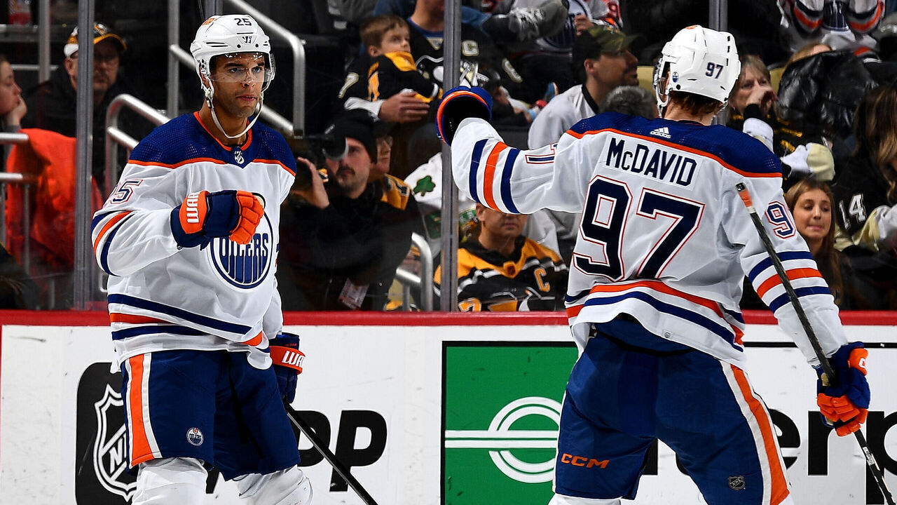 PITTSBURGH, PA - MARCH 10: Darnell Nurse #25 celebrates his goal with Connor McDavid #97 of the Edmonton Oilers during the third period against the Pittsburgh Penguins at PPG PAINTS Arena on March 10, 2024 in Pittsburgh, Pennsylvania.