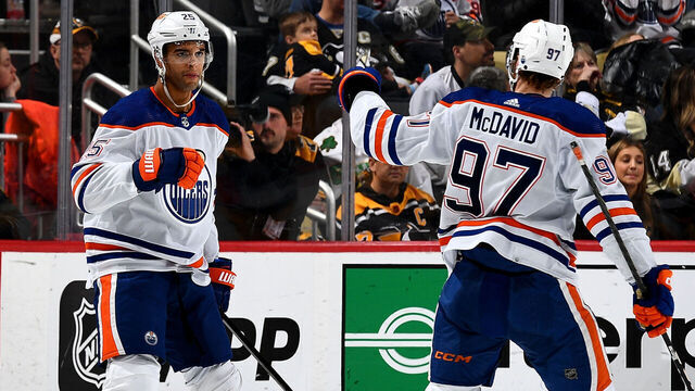 PITTSBURGH, PA - MARCH 10: Darnell Nurse #25 celebrates his goal with Connor McDavid #97 of the Edmonton Oilers during the third period against the Pittsburgh Penguins at PPG PAINTS Arena on March 10, 2024 in Pittsburgh, Pennsylvania.