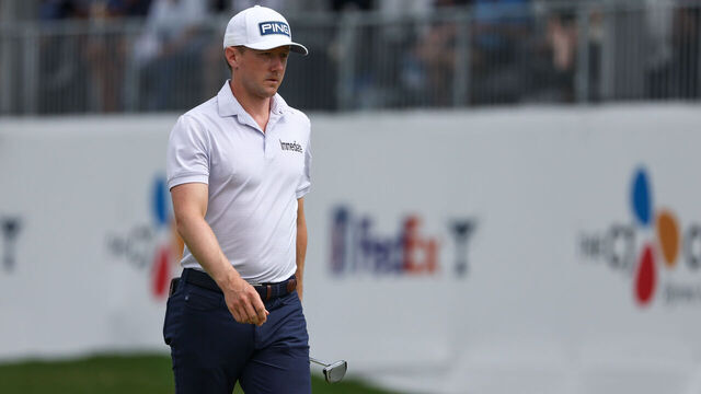 MCKINNEY, TX - MAY 02: Mackenzie Hughes (CAN) walks towards the cup after missing a birdie putt on the 17th hole during the first round of the PGA CJ Cup Byron Nelson on May 2, 2024, at TUP Craig Ranch in McKinney, TX.