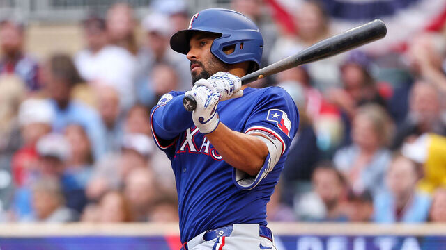 MINNEAPOLIS, MINNESOTA - MAY 24: Marcus Semien #2 of the Texas Rangers hits a single against the Minnesota Twins during the second inning at Target Field on May 24, 2024 in Minneapolis, Minnesota.