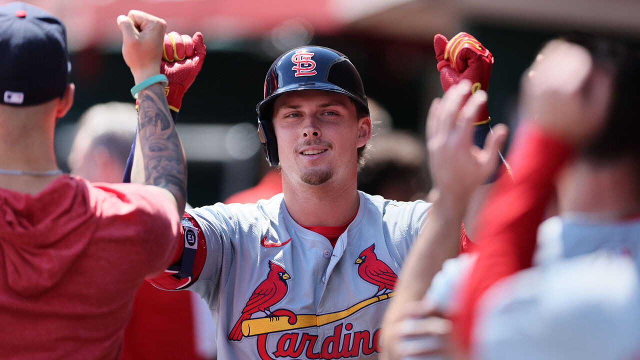 CINCINNATI, OHIO - MAY 29: Nolan Gorman #16 of the St. Louis Cardinals celebrates with teammates after hitting a home run in the 8th inning against the Cincinnati Reds at Great American Ball Park on May 29, 2024 in Cincinnati, Ohio.