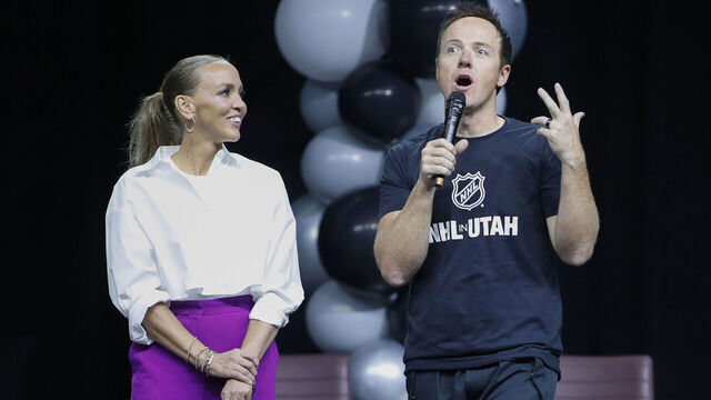 SALT LAKE CITY, UT - APRIL 24: (L-R) Team owners Ashley and Ryan Smith of the yet to be named NHL Utah hockey team speak before the players are introduced to the fans at the Delta Center on April 24, 2024 in Salt Lake City, Utah. The NHL has allowed the sale of the Arizona Coyotes and the team will relocate to Salt Lake City, Utah.