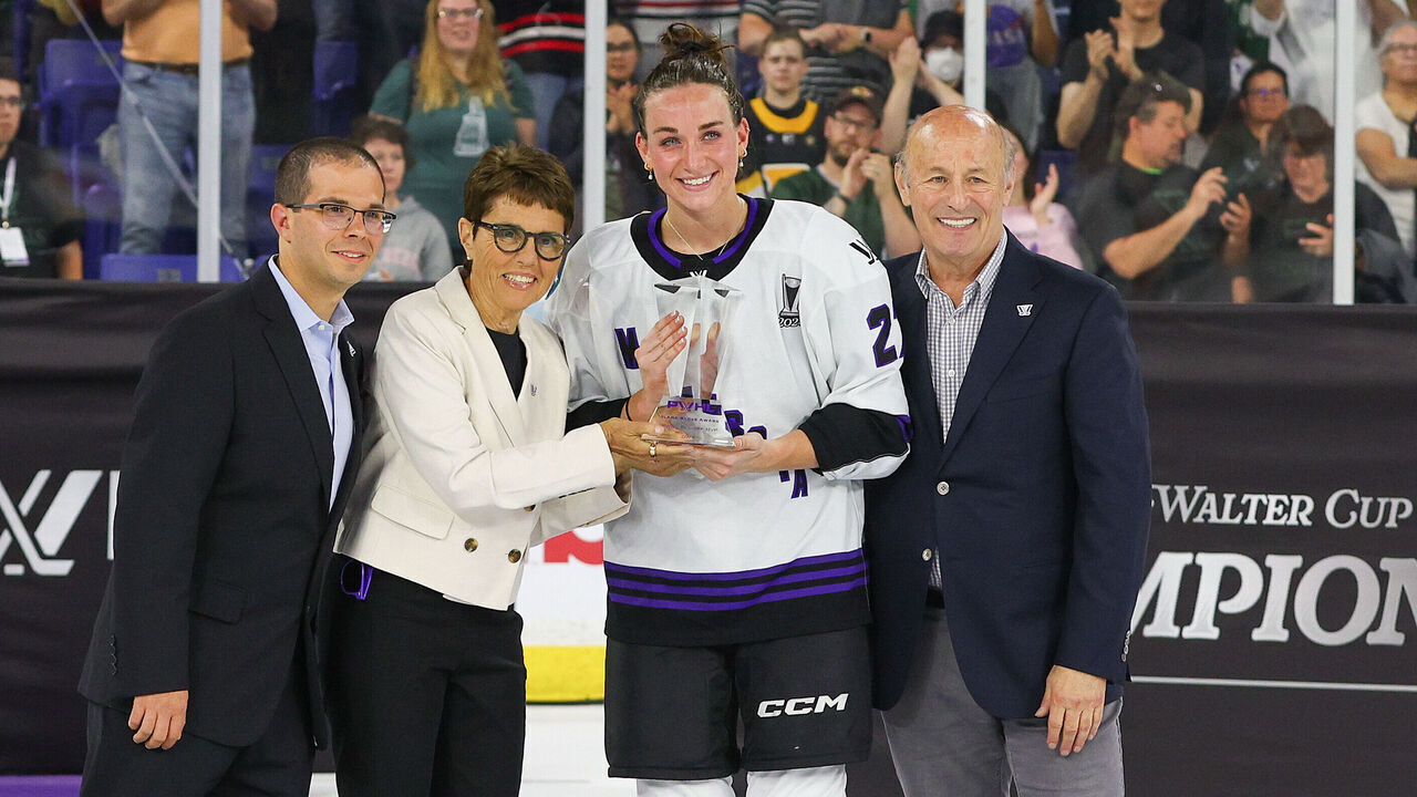 LOWELL, MA - MAY 29: Minnesota forward Taylor Heise (27) is presented with the PWHL Playoff MVP Award at the conclusion of game 5 of the PWHL Walter Cup Finals on May 29, 2024, at Tsongas Center in Lowell, MA.