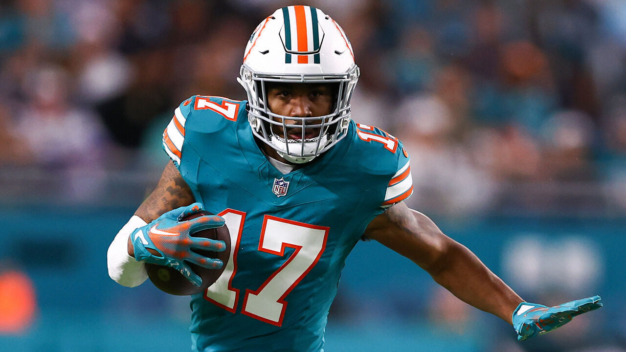 MIAMI GARDENS, FLORIDA - DECEMBER 24: Jaylen Waddle #17 of the Miami Dolphins runs the ball during the fourth quarter in the game against the Dallas Cowboys at Hard Rock Stadium on December 24, 2023 in Miami Gardens, Florida.