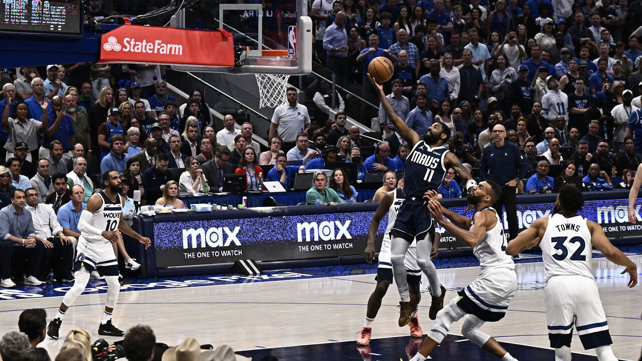 DALLAS, TX - MAY 28: Kyrie Irving #11 of the Dallas Mavericks drives to the basket during the game against the Minnesota Timberwolves during Round 3 Game 4 of the 2024 NBA Playoffs on May 28, 2024 at the American Airlines Center in Dallas, Texas. Mandatory Copyright Notice: Copyright 2024 NBAE