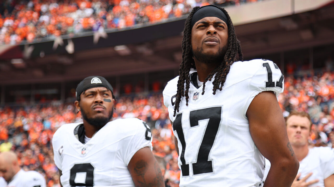 Football: Las Vegas Raiders Davante Adams (17) and Josh Jacobs (8) in action, stand for the National Anthem vs. Denver Broncos at Empower Field at Mile High Stadium. Denver, CO 9/10/2023 CREDIT: Jamie Schwaberow (Set Number: X164422 TK1)