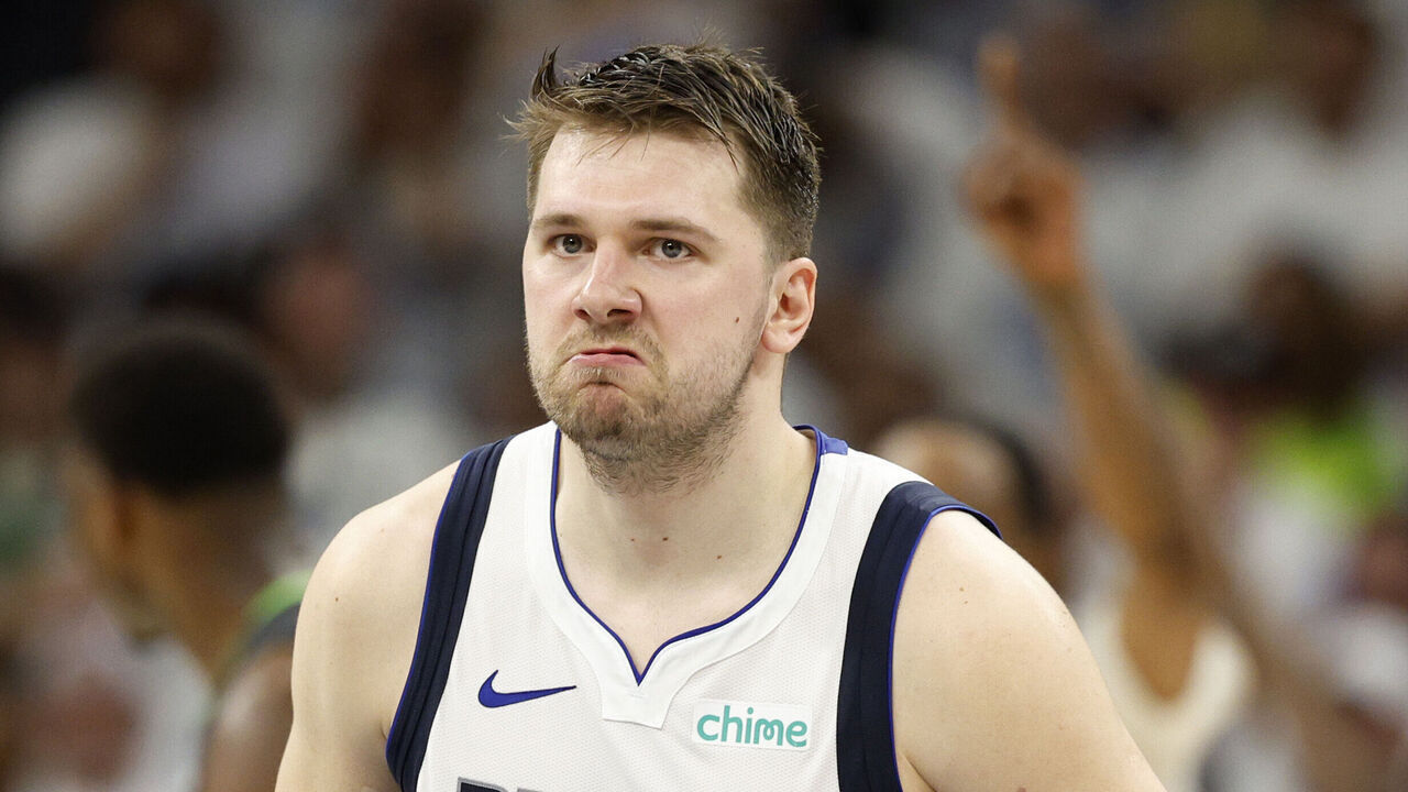 MINNEAPOLIS, MINNESOTA - MAY 30: Luka Doncic #77 of the Dallas Mavericks reacts after a basket during the second quarter against the Minnesota Timberwolves in Game Five of the Western Conference Finals at Target Center on May 30, 2024 in Minneapolis, Minnesota.