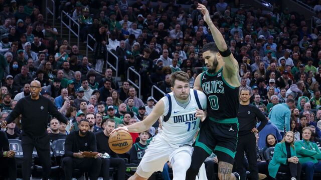 Boston, MA - March 1: Dallas Mavericks guard Luka Doncic drives to the basket on Boston Celtics forward Jayson Tatum in the third quarter. The Celtics beat the Dallas Mavericks, 138-110.