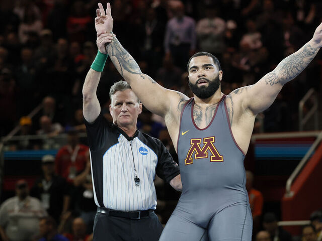 DETROIT, MI - MARCH 19: Gable Steveson of the Minnesota Golden Gophers defeats Cohlton Schultz of the Arizona State Sun Devils in the 285-pound final match during the Division I Men's Wrestling Championship held at Little Caesars Arena on March 19, 2022 in Detroit, Michigan.