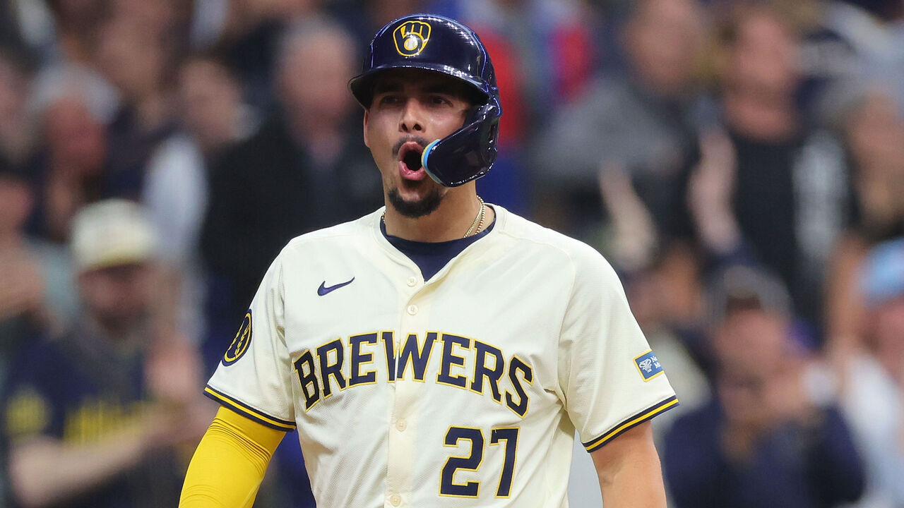 MILWAUKEE, WISCONSIN - MAY 29: Willy Adames #27 of the Milwaukee Brewers reacts after scoring against the Chicago Cubs during the third inning at American Family Field on May 29, 2024 in Milwaukee, Wisconsin.