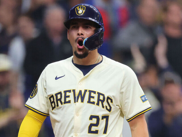 MILWAUKEE, WISCONSIN - MAY 29: Willy Adames #27 of the Milwaukee Brewers reacts after scoring against the Chicago Cubs during the third inning at American Family Field on May 29, 2024 in Milwaukee, Wisconsin.