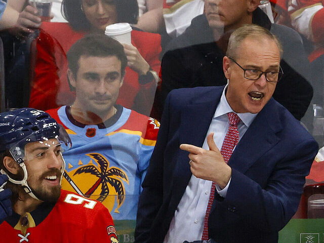 SUNRISE, FL - MAY 26: Head coach Paul Maurice of the Florida Panthers reacts to a conversation with referee Eric Furlatt #27 during third period action against of the New York Rangers in Game Three of the Eastern Conference Final of the 2024 Stanley Cup Playoffs at the Amerant Bank Arena on May 26, 2024 in Sunrise, Florida.