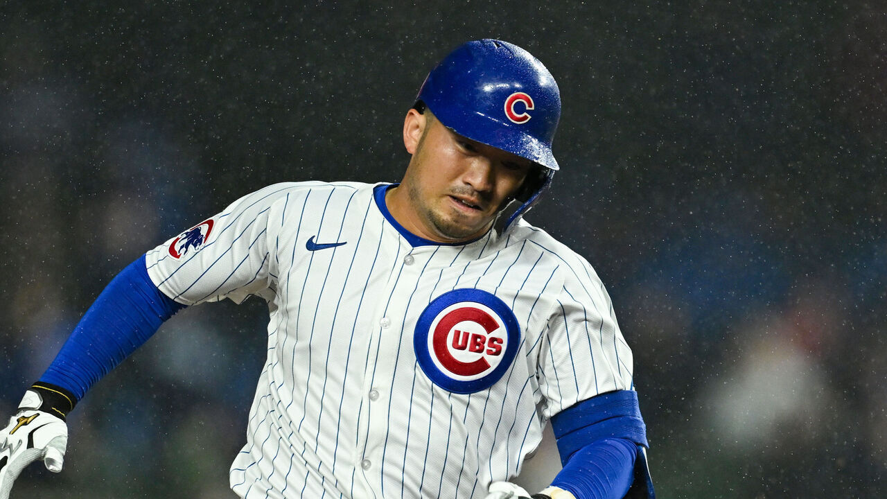 CHICAGO, ILLINOIS - JUNE 01: Seiya Suzuki #27 of the Chicago Cubs hits a triple in the first inning against Hunter Greene of the Cincinnati Reds at Wrigley Field on June 01, 2024 in Chicago, Illinois.