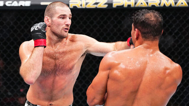 NEWARK, NEW JERSEY - JUNE 01: (L-R) Sean Strickland punches Paulo Costa of Brazil in a middleweight fight during the UFC 302 event at Prudential Center on June 01, 2024 in Newark, New Jersey.
