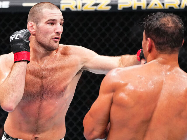 NEWARK, NEW JERSEY - JUNE 01: (L-R) Sean Strickland punches Paulo Costa of Brazil in a middleweight fight during the UFC 302 event at Prudential Center on June 01, 2024 in Newark, New Jersey.