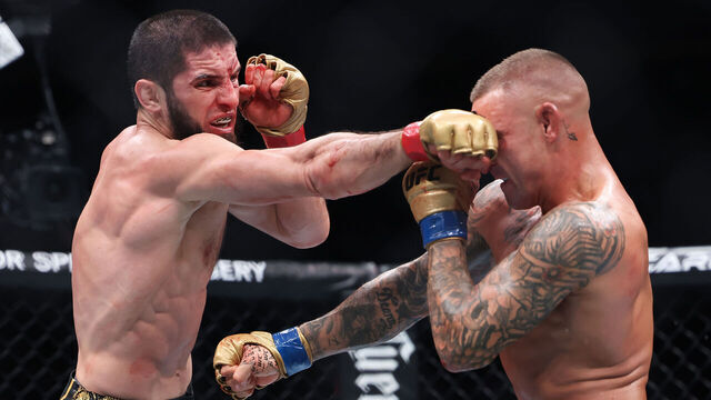 NEWARK, NEW JERSEY - JUNE 01: (R-L) Dustin Poirier and Islam Makhachev of Russia exchange strikes in their lightweight title bout during UFC 302 at Prudential Center on June 01, 2024 in Newark, New Jersey.