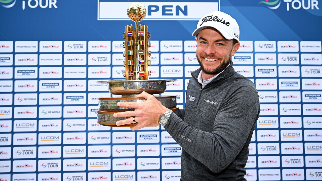 HAMBURG, GERMANY - JUNE 02: Laurie Canter of England celebrates victory with the trophy following Day Four of the European Open at Green Eagle Golf Course on June 02, 2024 in Winsen, Germany.