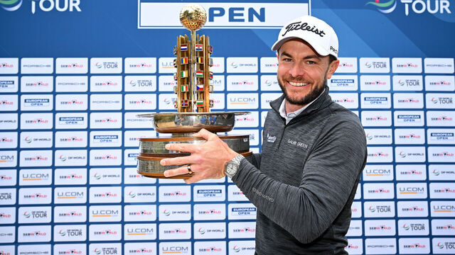 HAMBURG, GERMANY - JUNE 02: Laurie Canter of England celebrates victory with the trophy following Day Four of the European Open at Green Eagle Golf Course on June 02, 2024 in Winsen, Germany.