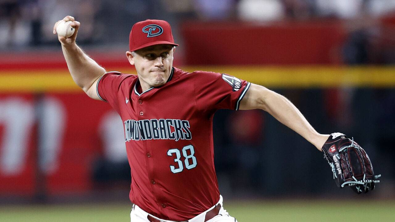 PHOENIX, ARIZONA - MAY 15: Relief pitcher Paul Sewald #38 of the Arizona Diamondbacks pitches against the Cincinnati Reds during the ninth inning at Chase Field on May 15, 2024 in Phoenix, Arizona. The Diamondbacks defeated the Reds 2-1.