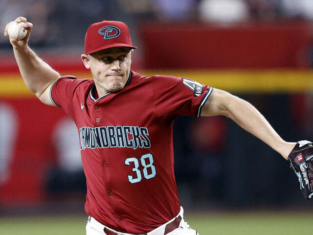 PHOENIX, ARIZONA - MAY 15: Relief pitcher Paul Sewald #38 of the Arizona Diamondbacks pitches against the Cincinnati Reds during the ninth inning at Chase Field on May 15, 2024 in Phoenix, Arizona. The Diamondbacks defeated the Reds 2-1.