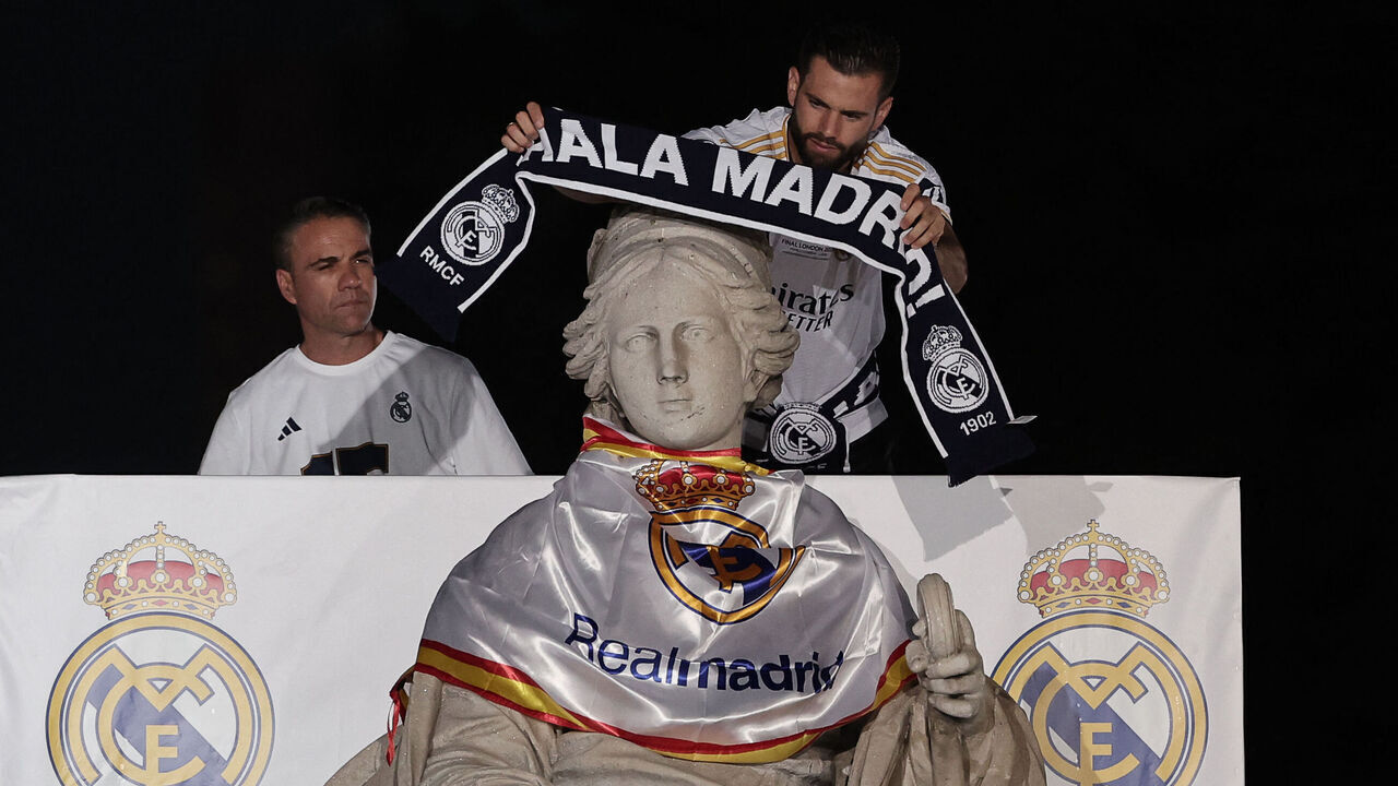 Real Madrid's Spanish defender #06 Nacho Fernandez celebrates their 15th Champions League win, one day after beating Borussia Dortmund in London, on Cibeles square in Madrid on June 2, 2024.