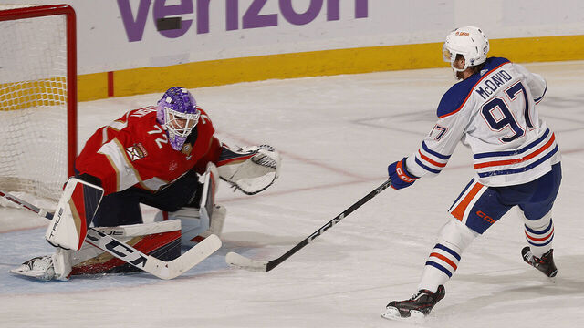 SUNRISE, FLORIDA - NOVEMBER 20: Goaltender Sergei Bobrovsky #72 of the Florida Panthers defends the net against Connor McDavid #97 of the Edmonton Oilers at the Amerant Bank Arena on November 20, 2023 in Sunrise, Florida.
