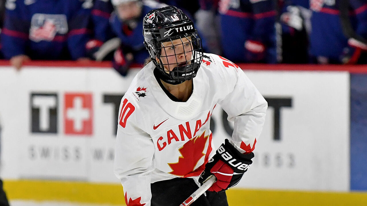 UTICA, NEW YORK - APRIL 14: Sarah Fillier #10 of Canada carries the puck in overtime against United States during the 2024 IIHF Women's World Championship Gold Medal game at Adirondack Bank Center on April 14, 2024 in Utica, New York.