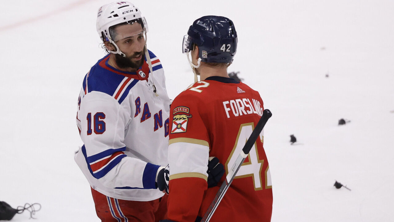 SUNRISE, FLORIDA - JUNE 01: Vincent Trocheck #16 of the New York Rangers shakes hands with Gustav Forsling #42 of the Florida Panthers after Game Six of the Eastern Conference Final of the 2024 Stanley Cup Playoffs at Amerant Bank Arena on June 01, 2024 in Sunrise, Florida.