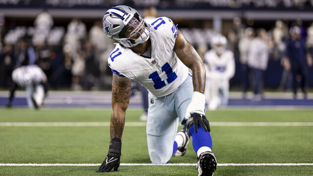 ARLINGTON, TEXAS - JANUARY 14: Micah Parsons #11 of the Dallas Cowboys stretches as he warms up prior to an NFL wild-card playoff football game between the Dallas Cowboys and the Green Bay Packers at AT&T Stadium on January 14, 2024 in Arlington, Texas.