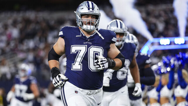 ARLINGTON, TX - OCTOBER 29: Zack Martin #70 of the Dallas Cowboys runs out of the tunnel prior to an NFL game against the Los Angeles Rams at AT&T Stadium on October 29, 2023 in Arlington, Texas.