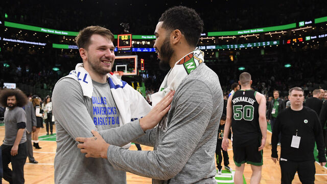 BOSTON, MA - MARCH 1: Jayson Tatum #0 of the Boston Celtics and Luka Doncic #77 of the Dallas Mavericks brace after the game on March 1, 2024 at the TD Garden in Boston, Massachusetts. Mandatory Copyright Notice: Copyright 2024 NBAE