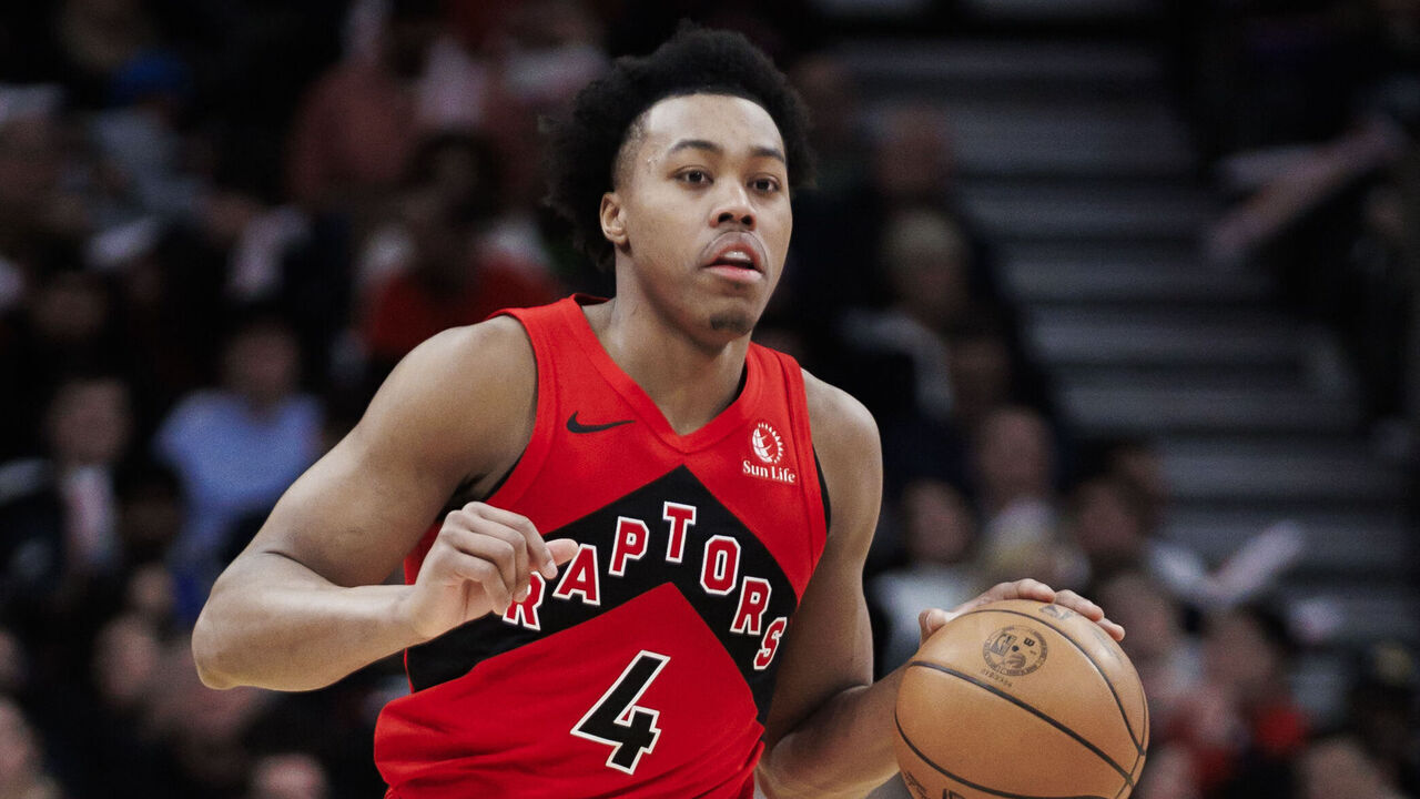 TORONTO, CANADA - FEBRUARY 28: Scottie Barnes #4 of the Toronto Raptors dribbles against the Dallas Mavericks second half of their NBA game at Scotiabank Arena on February 28, 2024 in Toronto, Canada.