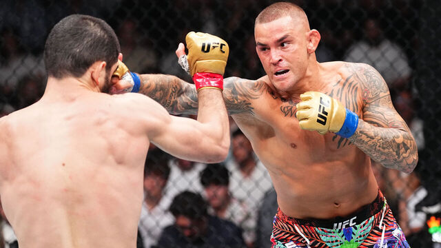NEWARK, NEW JERSEY - JUNE 01: (R-L) Dustin Poirier punches Islam Makhachev of Russia in the UFC lightweight championship fight during the UFC 302 event at Prudential Center on June 01, 2024 in Newark, New Jersey.