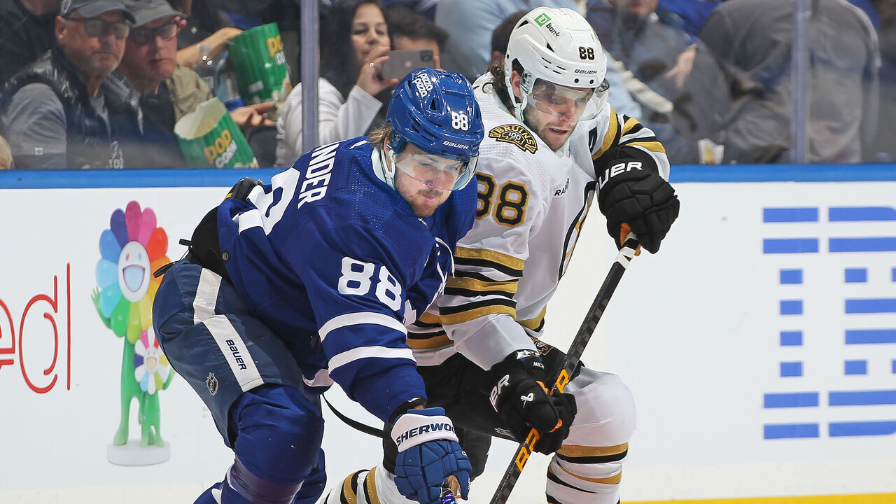 TORONTO, CANADA - APRIL 27: David Pastrnak #88 of the Boston Bruins battles for the puck against William Nylander #88 of the Toronto Maple Leafs in Game Four of the First Round of the 2024 Stanley Cup Playoffs at Scotiabank Arena on April 27, 2024 in Toronto, Ontario, Canada. The Bruins defeated the Maple Leafs 3-1.